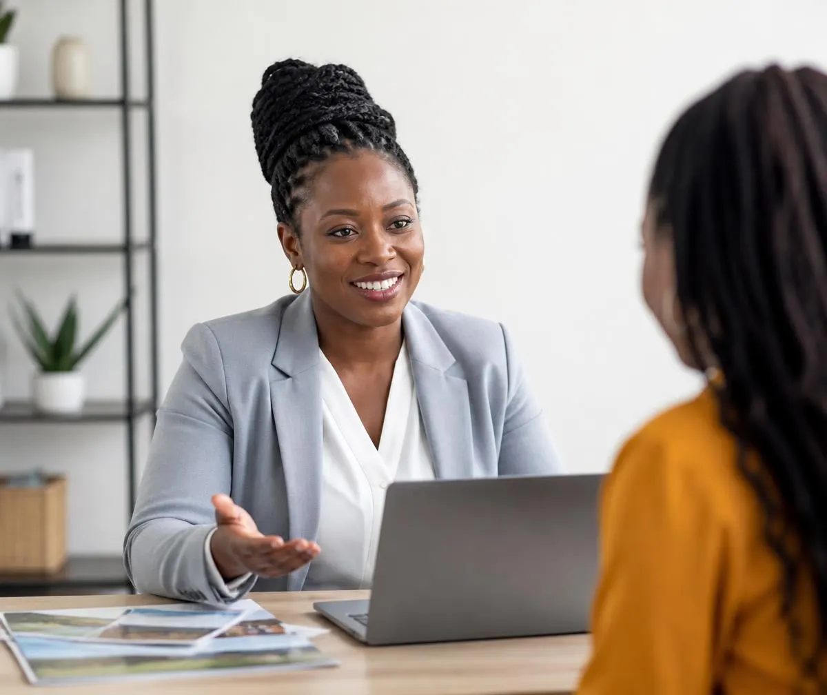 Travel consultant meeting a client